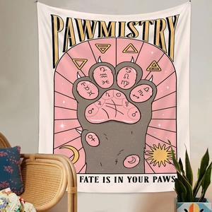 Detail of bohemian Pawmistry tapestry featuring a cat paw design with zodiac symbols