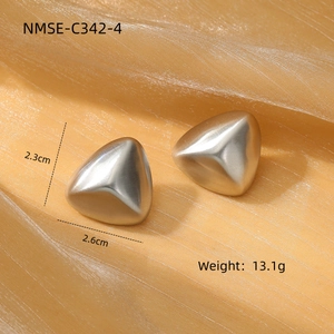 Macro view of brushed matte geometric triangle earrings with dimensions and weight info