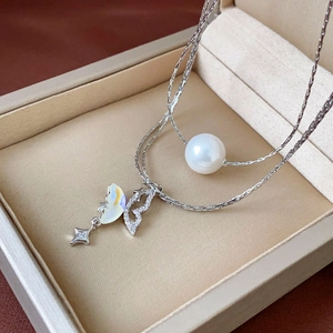 Double-layered silver necklace with zircons, butterfly pendant and white round pearl