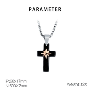 Detail view of two-tone cross pendant with dimensions 26x17mm and 600mm chain specs