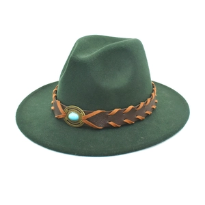Detail of dark green wool fedora with brown braided leather band and turquoise buckle