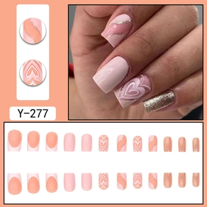 Sweet pink and gold glitter press-on nails with heart patterns, 24-piece full set