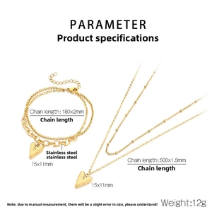 Detail view of 18K gold plated heart necklace and bracelet set with size specifications