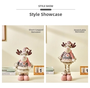 Detail of plush Christmas reindeer dolls in dusty pink and grey with retractable legs