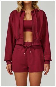 Detailed view of women's burgundy three-piece sports set with drawstring waist and zipper hoody