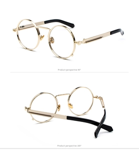 Close-up of gold metal frame sunglasses featuring spring temple steampunk design
