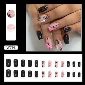 Glossy black and pink square press-on nails with daisy patterns and French style tips