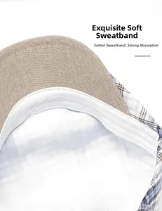 Detail of soft cotton sweatband on plaid newsboy cap with high-quality stitching