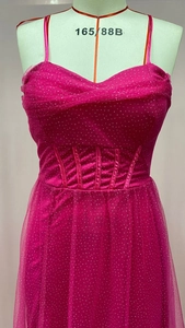 Detail of hot pink dress showing corset boning structure and silver sequin glitter tulle