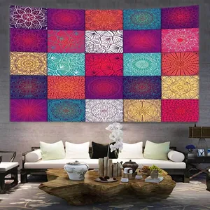 Detail of bohemian mandala tapestry featuring vibrant patchwork patterns on a living room wall