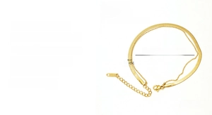 Detail of 18K gold plated stainless steel double layer anklet with flat blade chain