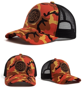 Detail of orange camouflage trucker hat with breathable mesh and Enjoy Life round patch