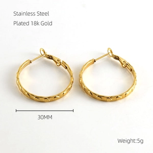 Detailed view of 30mm 18k gold plated stainless steel hoop earrings with textured finish
