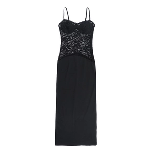 Detailed view of black lace stitching and slim fit hemline on a sexy backless party dress