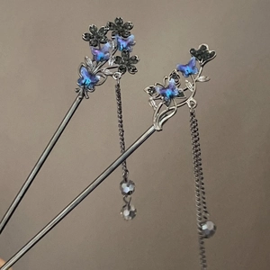 Dark blue butterfly hair pin set with silver metallic base and elegant tassels