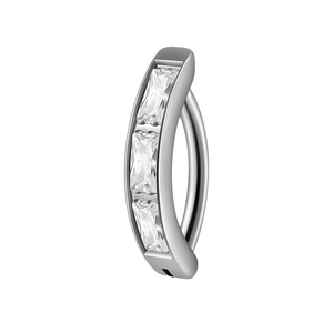 Curved stainless steel belly ring featuring three rectangular opal-like zirconia stones