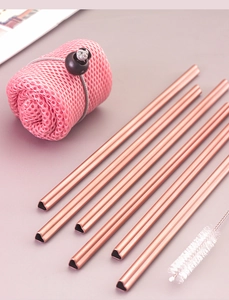 Pink heart-shaped stainless steel straws set with a cleaning brush and mesh bag