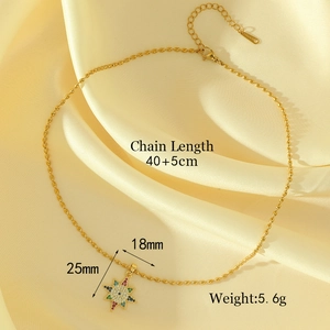 Golden star pendant necklace with colorful zircon, 40+5cm chain on silk background