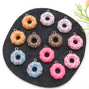 Colorful resin donut pendants with sugar sprinkles for DIY jewelry and accessories