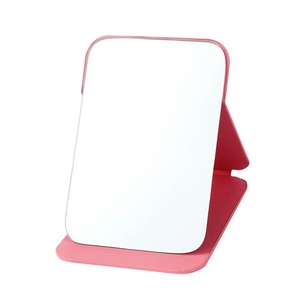 Detail showing the pink PU leather folding stand and clear glass of a portable makeup mirror