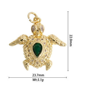 Golden sea turtle pendant with green gemstone, dimensions 22mm x 23.7mm and weight 3.1g