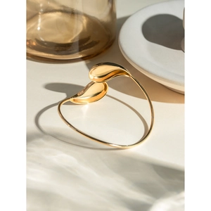 Polished 18k gold plated stainless steel teardrop cuff bracelet in minimalist style