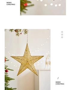Close-up of a golden hollow five-pointed star ornament with glitter on a festive background