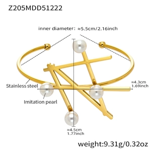 Detail showing 18k gold plated geometric hair clip and open bangle set with pearls