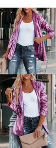 Detail of hot pink sequin blazer jacket showing shimmering texture and lapel design