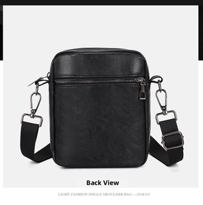 Detailed rear view of minimalist black PU leather crossbody bag with lychee texture