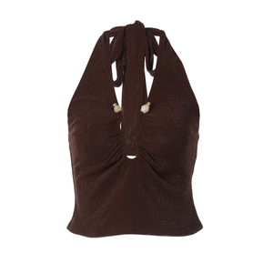 Detail of glittery dark brown halter crop top with central white stone ornament
