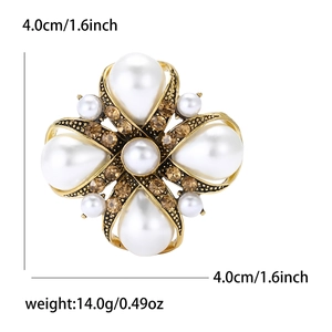 Baroque pearl brooch in gold finish with amber rhinestones measuring 4.0cm x 4.0cm