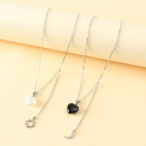Minimalist stainless steel sun and moon friendship necklaces with heart stone pendants
