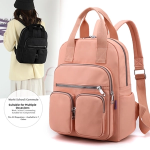 Detail view of large capacity nylon backpack showing multiple zipper pockets and A4 storage size