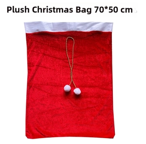 Detailed view of red velvet Christmas gift bag with white faux fur trim, 70x50cm size