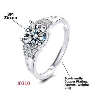 Macro detail of silver-tone ring with 8mm cubic zirconia in a 6-claw setting