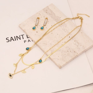 Gold stainless steel jewelry set with double layer blue teardrop zircon and evil eye motifs
