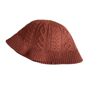Women's summer cotton linen knit bucket hat in rust red with twist cable pattern texture