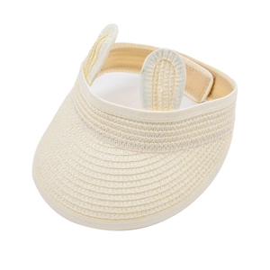 Detail of beige straw sun hat with cute cat ears and adjustable velcro closure strap