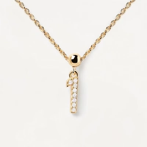 Macro shot of gold-plated S925 silver number 1 pendant necklace with shimmering zircon stones