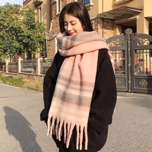 Pink and grey plaid mohair scarf with tassels for winter warmth in outdoor street style