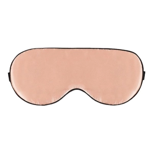 Breathable silk blackout sleep mask in pink gold with black piping for travel