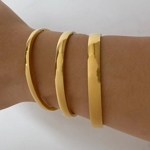 Minimalist gold titanium steel open bangle set in three different widths for women