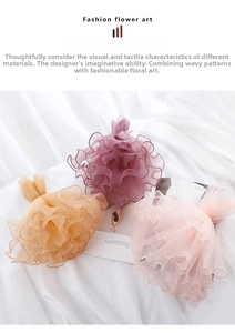Detail of pleated pearl gauze mesh in yellow and pink for DIY flower bouquet wrapping