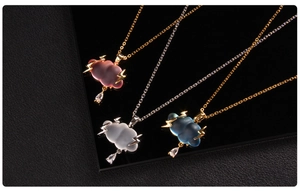 Detailed macro view of matte cloud lightning necklaces with sparkling water-drop zircon charms