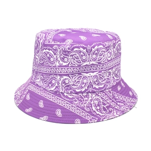 Detailed close-up of the purple paisley print and stitching on the fabric bucket hat