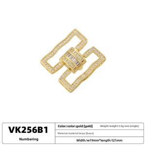 Macro shot of 19mm gold-plated brass jewelry clasp with sparkling cubic zirconia settings