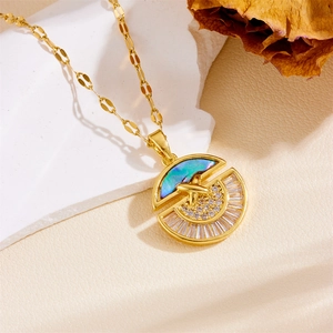 Detail of fan-shaped golden necklace with iridescent blue shell and zircon crystals