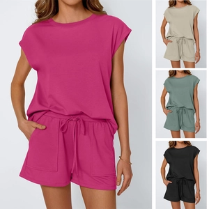 Detail of round neck top and drawstring shorts with side pockets in four colors
