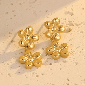 Golden stainless steel flower tassel earrings with a polished finish and elegant design